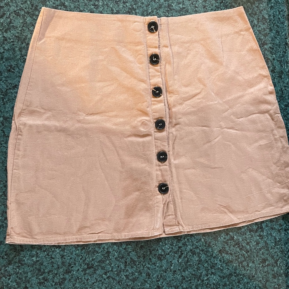 Nude/ pink skirt